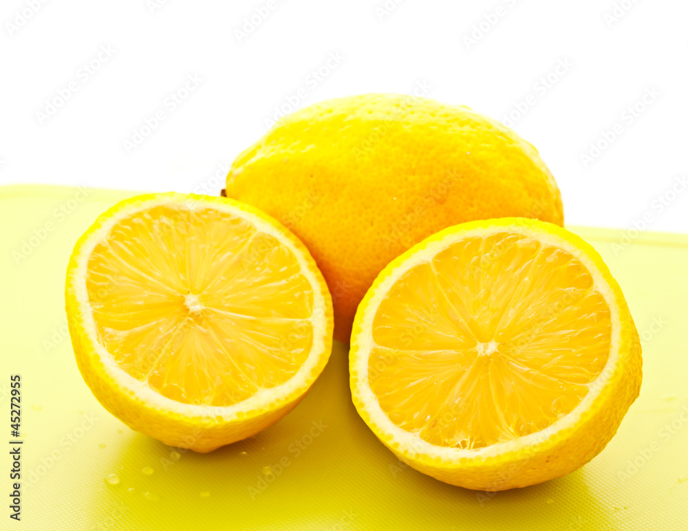 cut lemon on white background