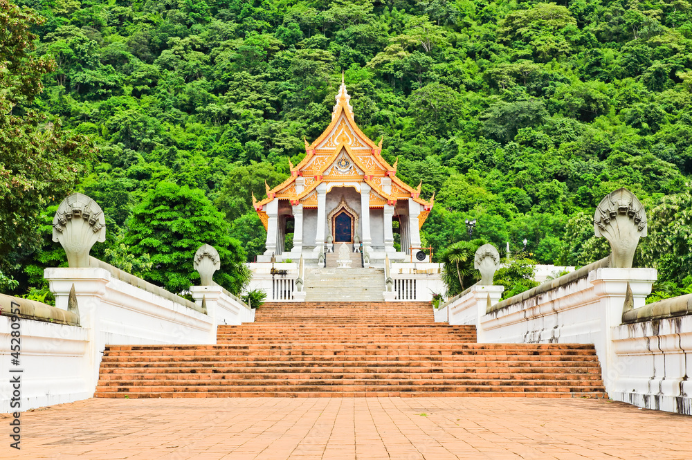 Beautiful thai church in front of the mountain