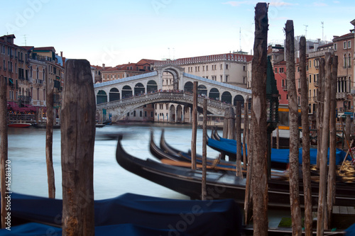 Railto bridge and moving gondolas Venice, Italy