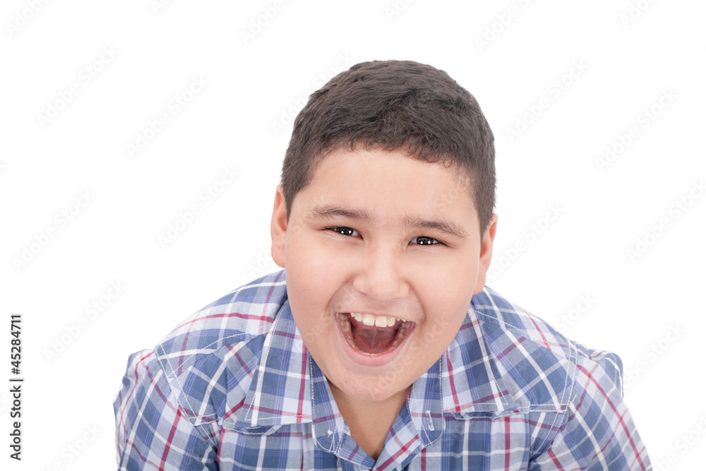 A boy screaming loud with mouth wide open A boy screaming loud with mouth wide open