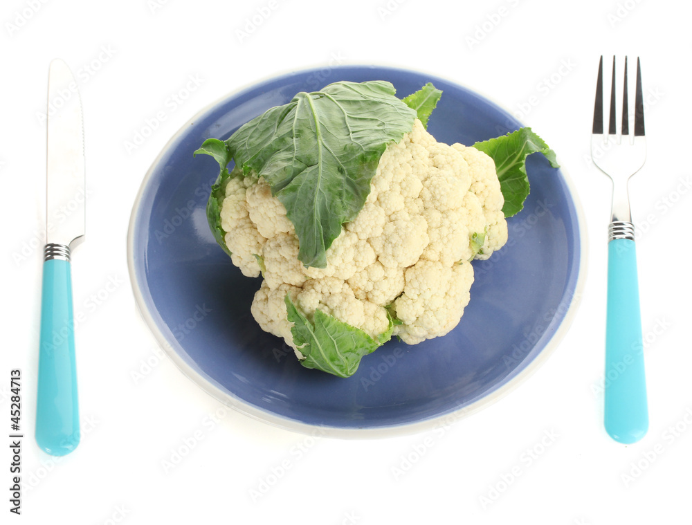 Fresh cauliflower on plate, knife and fork isolated on white Fresh cauliflower on plate, knife and fork isolated on white