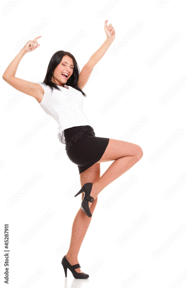 A joyous young female business executive celebrating success rai A joyous young female business executive celebrating success rai