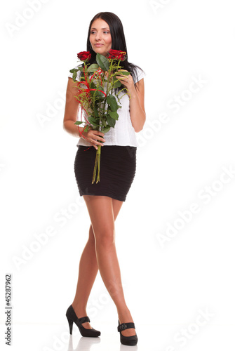 Beautiful young girl posing with a red rose woman isolated