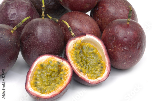 Shot of isolated passion fruit , cut open
