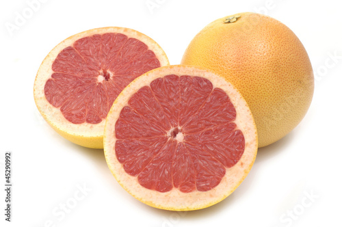 Whole fresh grapefruit and slices