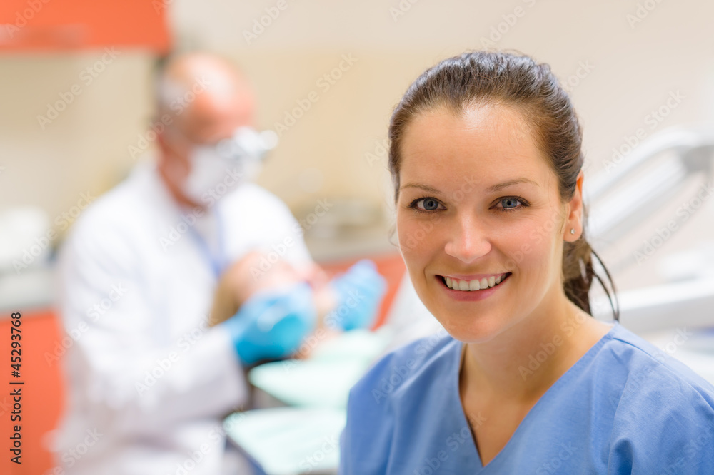 Dental assistant smiling woman friendly nurse Dental assistant smiling woman friendly nurse