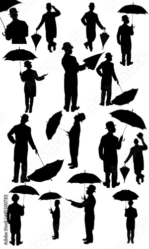 Canvas Print Man with a hat and umbrella
