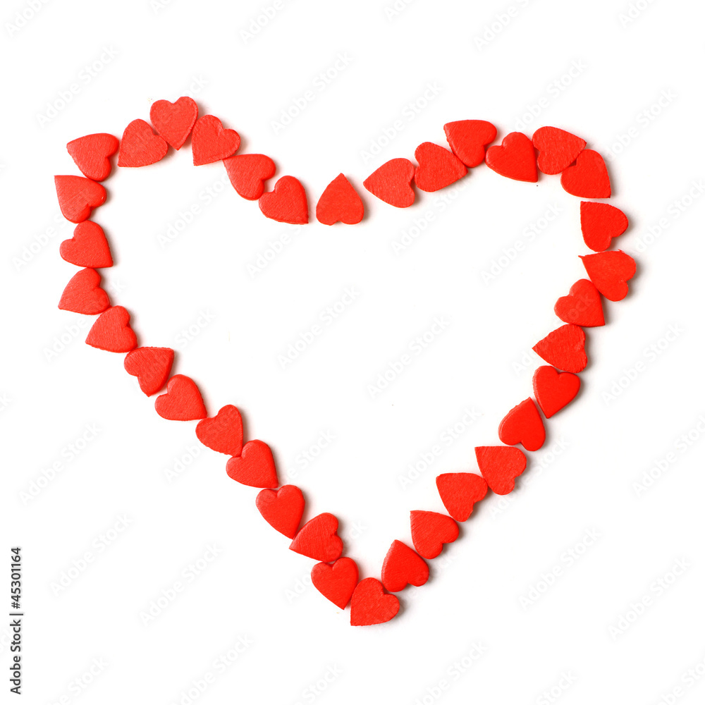 Red heart shape symbol made from many hearts isolated on white 