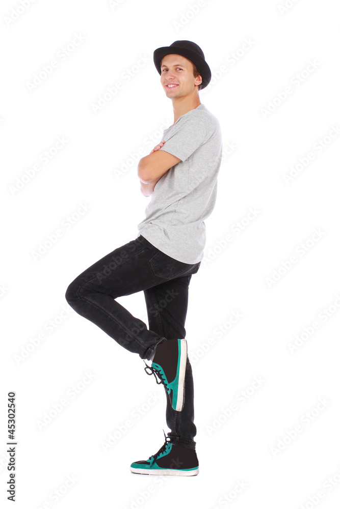 Naklejka premium Young handsome guy with a modern clothes and a hat