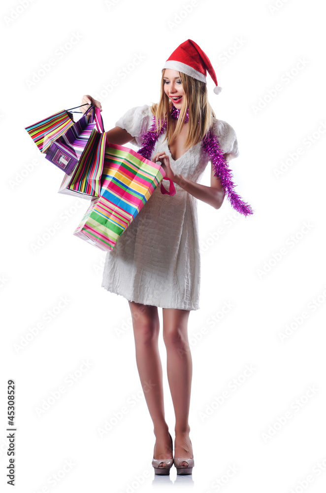 Young woman in christmas shopping concept Young woman in christmas shopping concept