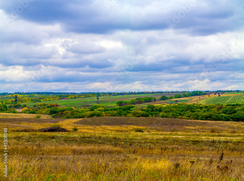 Landscape autumn, clouds, a field.4