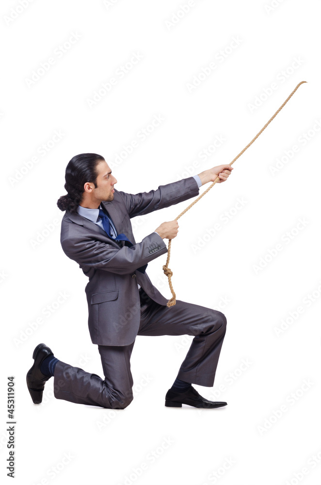Businessman pulling rope on white Businessman pulling rope on white