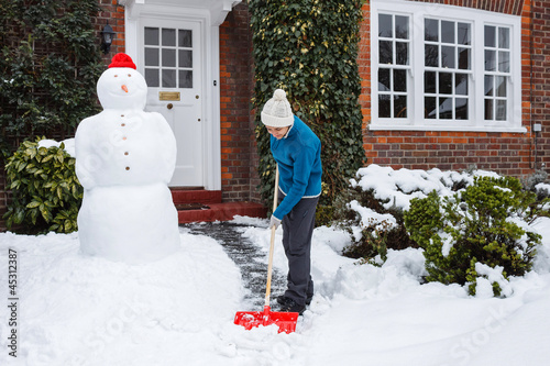 Photography Person shoveling snow
