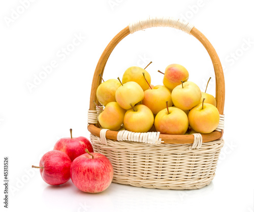 basket of apples on a white background