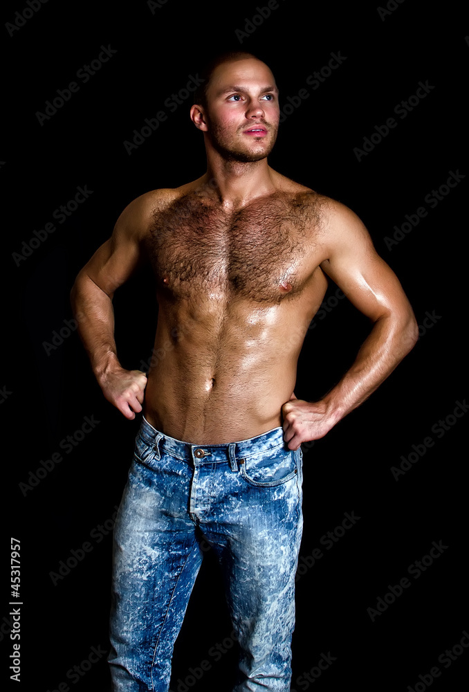 Portrait of a handsome muscular guy with nude torso Portrait of a handsome muscular guy with nude torso