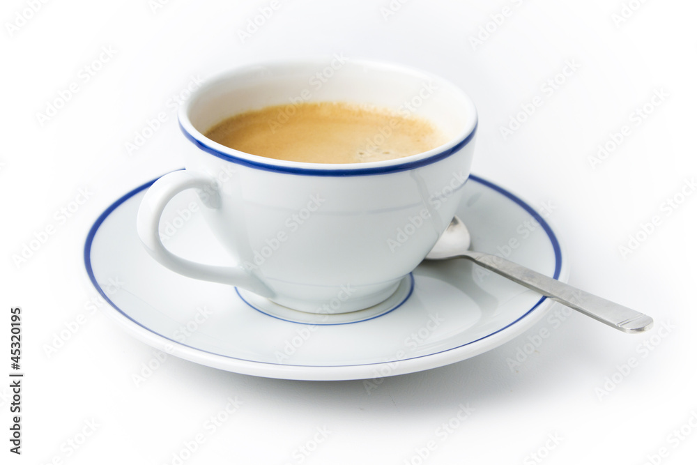 White cup of coffee on plate with spoon on white background