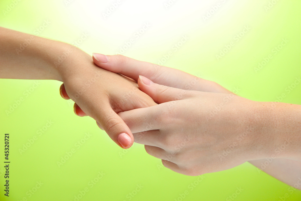Hand massage, on green background