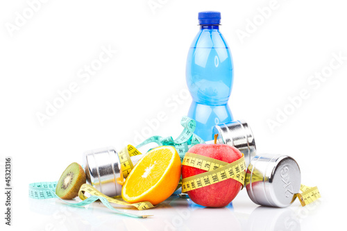 fitness dumbbells, water and fruits