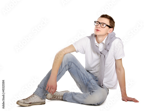 Man sitting on the floor isolated on white background