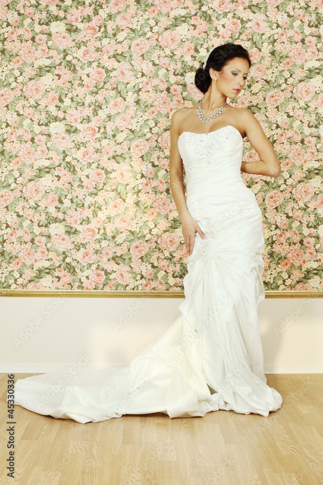Beautiful woman in white evening gown, fashion portrait Beautiful woman in white evening gown, fashion portrait