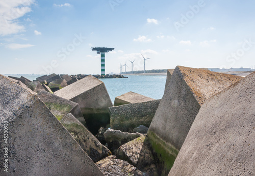 Closeup of large concrete blocks in the Dutch North Sea photo