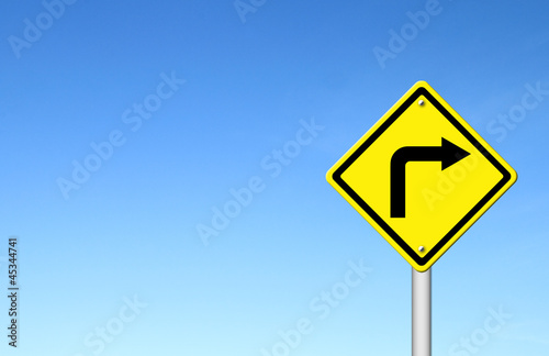 Road Sign - Right Turn Warning with blue sky