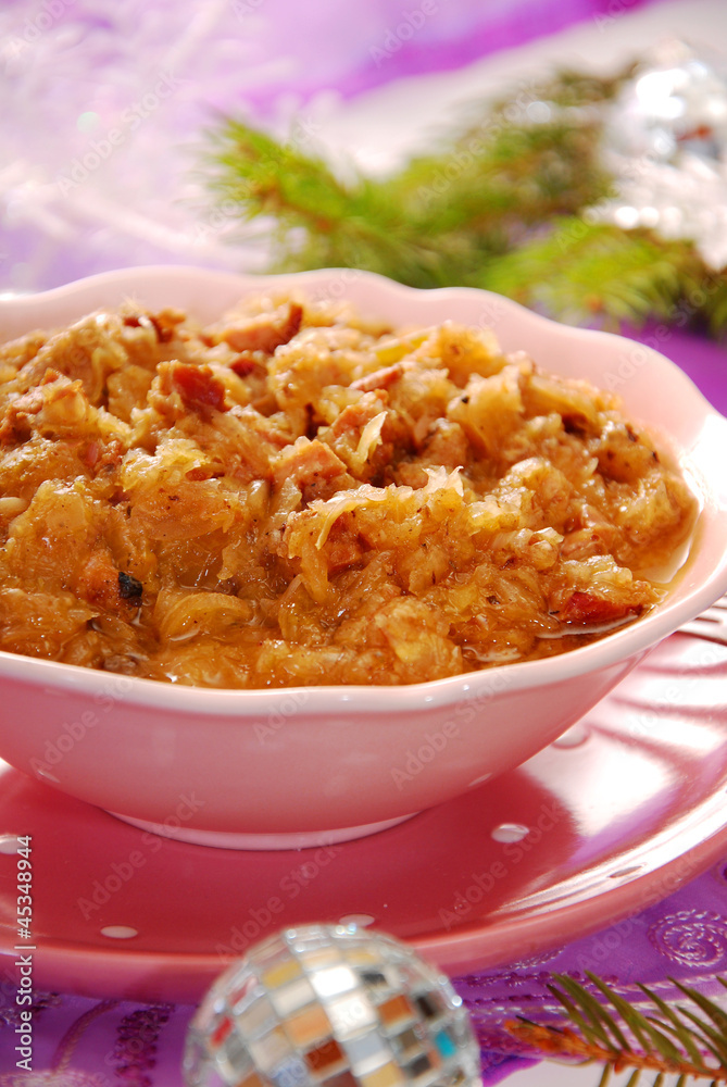 bowl of sauerkraut (bigos) with sausage for christmas