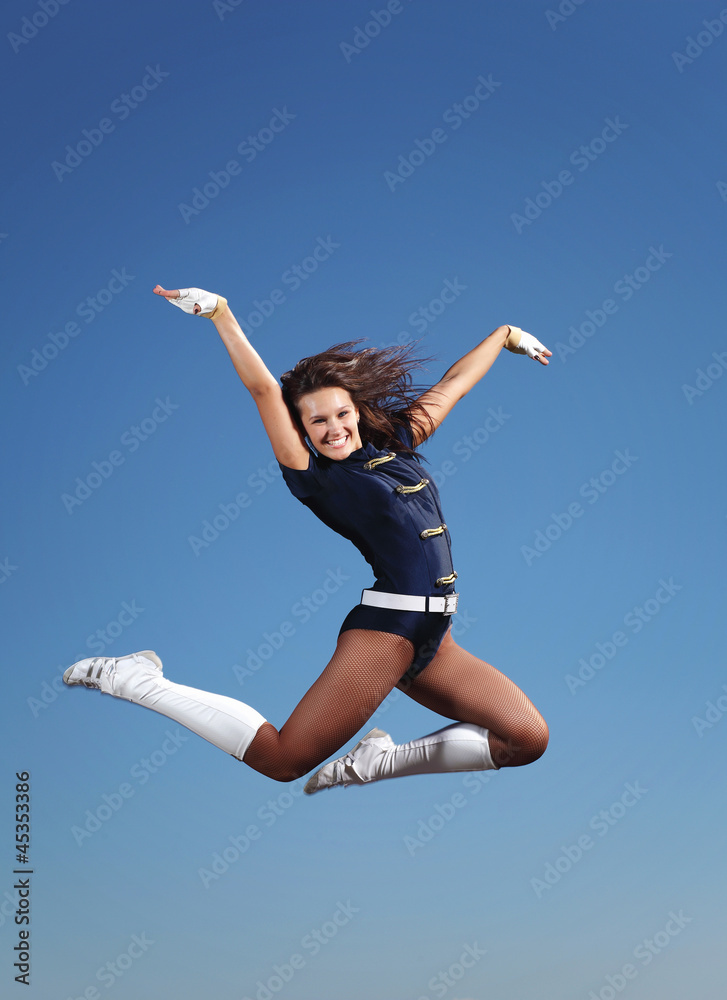 Young female dancer against white background Young female dancer against white background