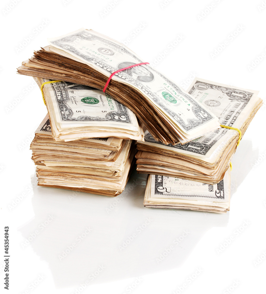 Stacks of dollars isolated on white Stacks of dollars isolated on white