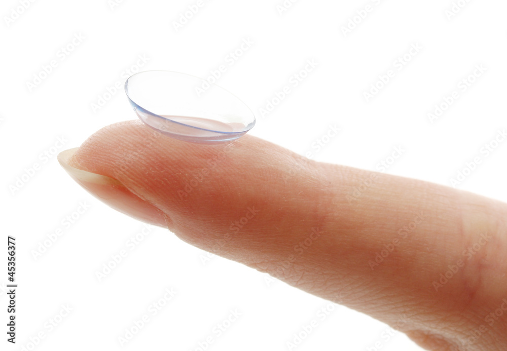 contact lens on finger isolated on white contact lens on finger isolated on white