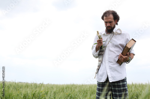 Man praying for good wheat year
