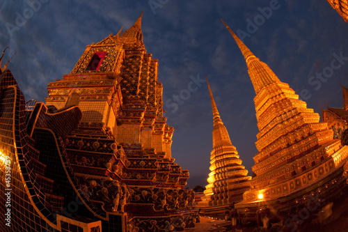 Night scene group of pagodas in Wat Pho temple,Thailand.