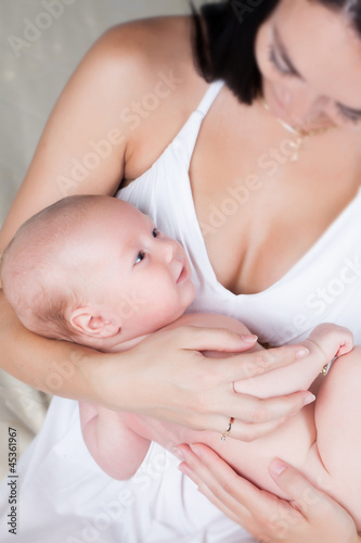 Mother with newborn sun