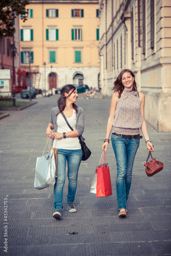 Couple of Women with Shopping Bags