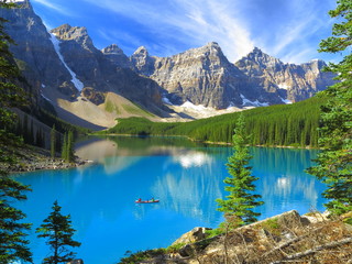 Tableau sur plexiglas Canada Vivid hues of Lake Moraine at Banff National Park, Canada  © cvmcgarry