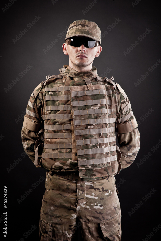 Military man on a black background Military man on a black background