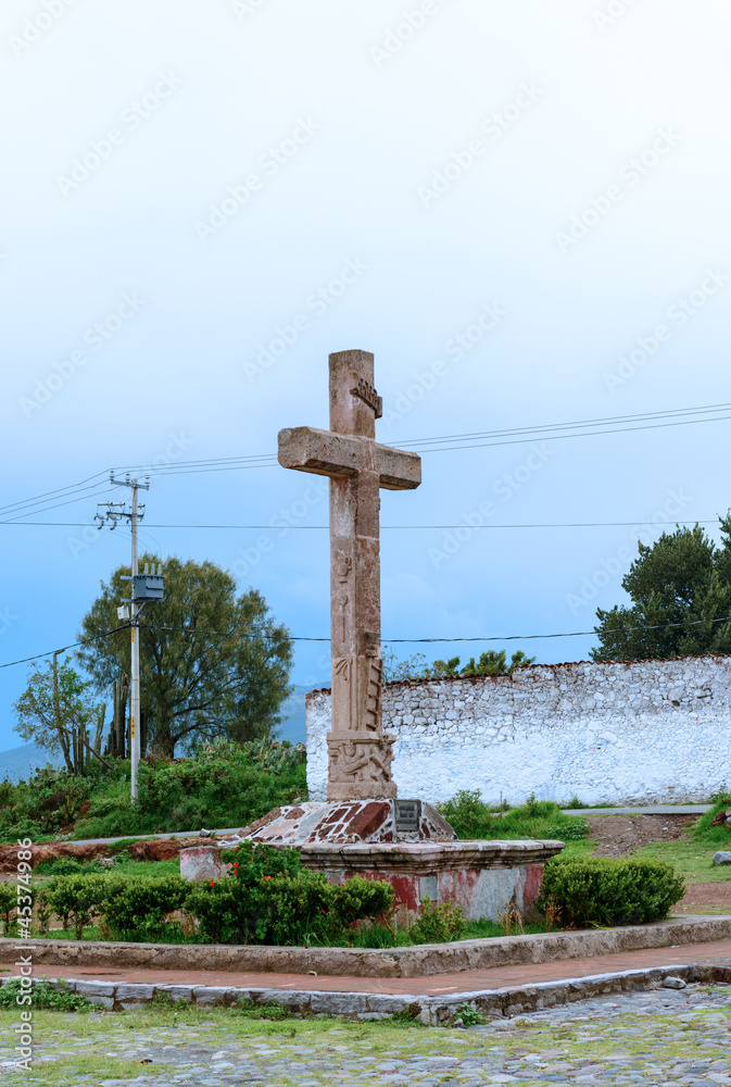 cross in front of Oxtotipac church and monastery, Mexico.