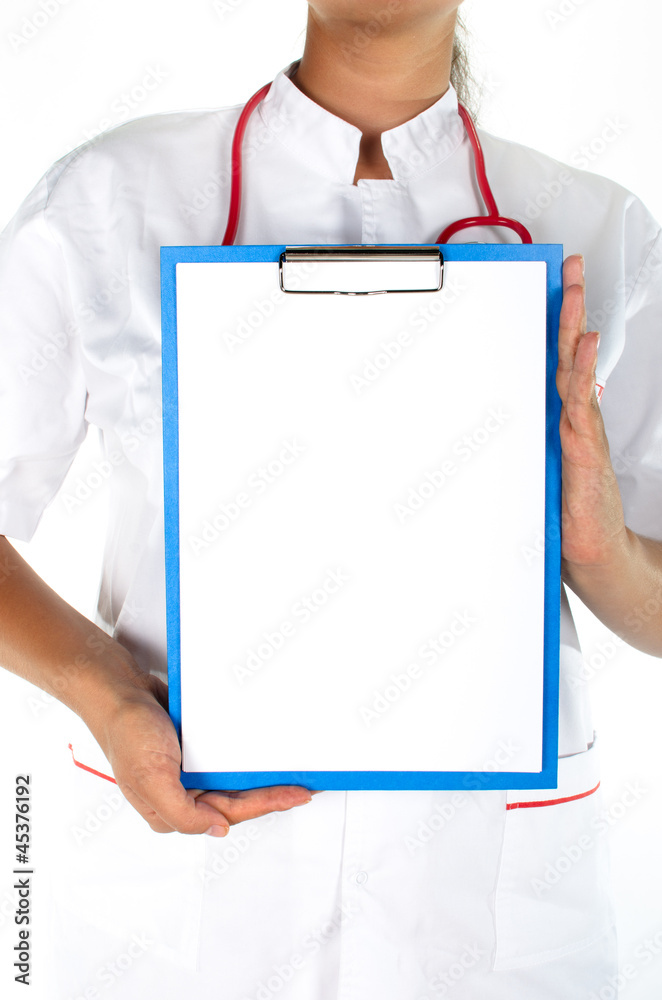 Medical sign - a female doctor showing clipboard with space for Medical sign - a female doctor showing clipboard with space for