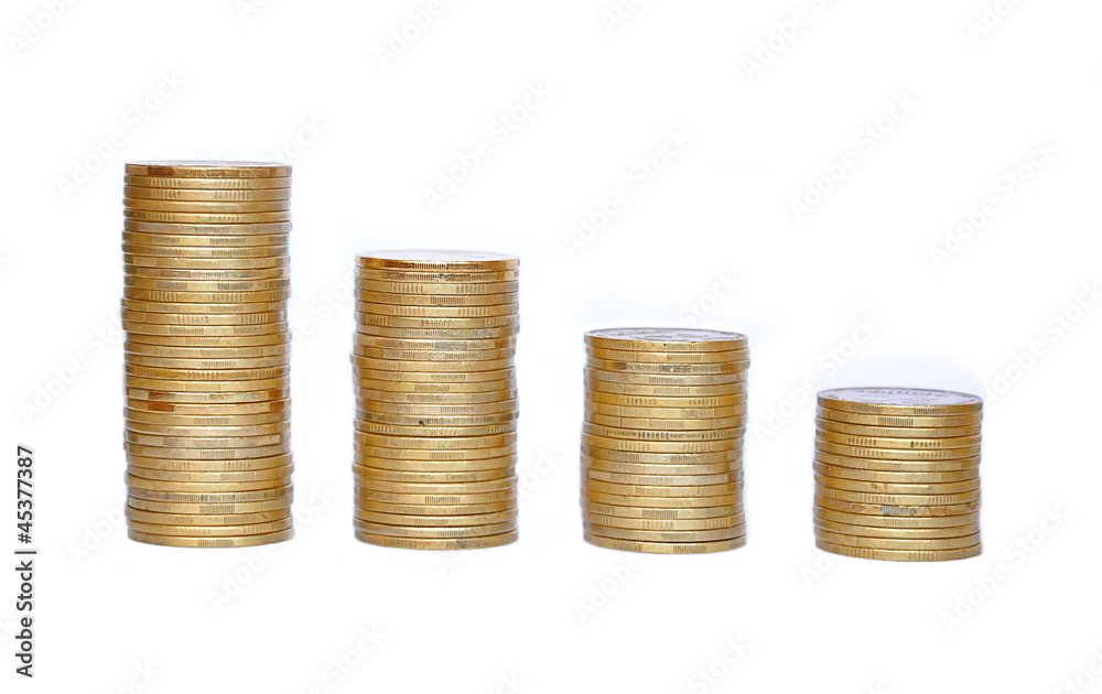 Many coins in column isolated on white Many coins in column isolated on white