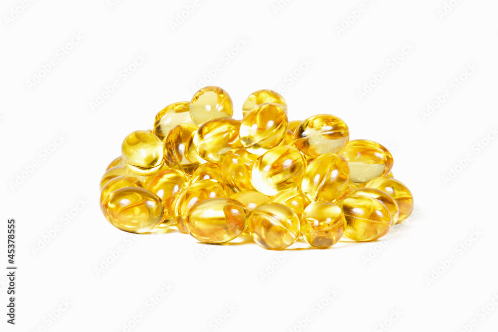 yellow omega 3 capsules isolated on white yellow omega 3 capsules isolated on white