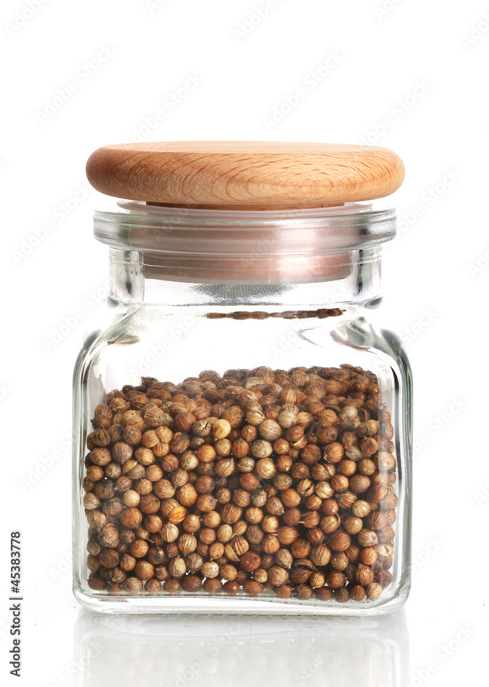 Jar of coriander seeds isolated on white Jar of coriander seeds isolated on white