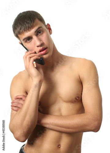 Young Sexy Man with a Cell Phone