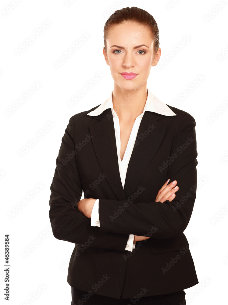A beautiful woman standing with her arms crossed A beautiful woman standing with her arms crossed
