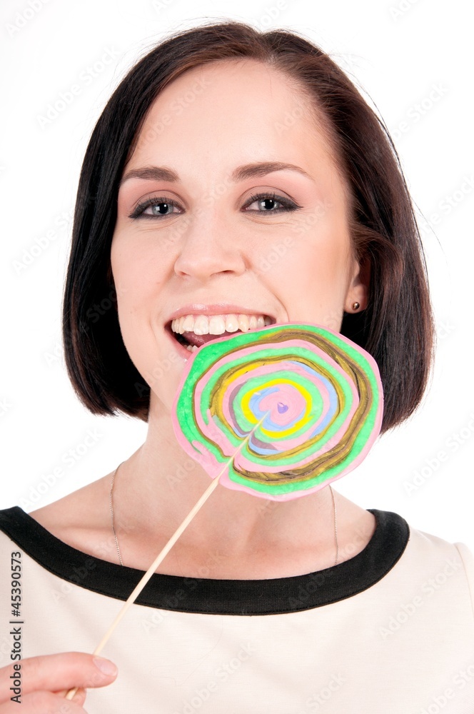 Beautiful woman with a lollipop, over white background