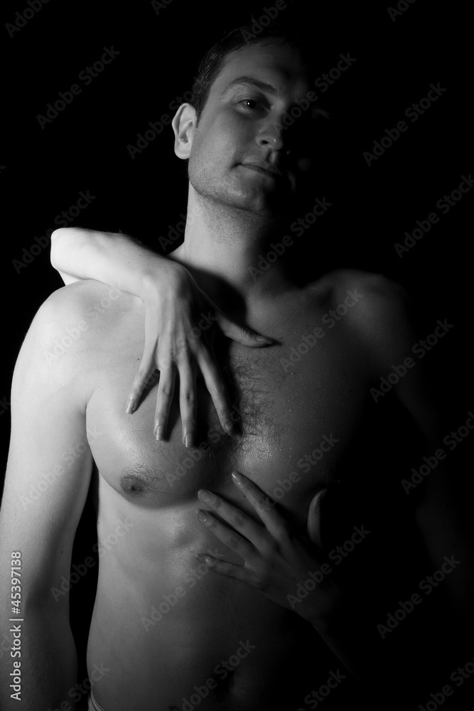 muscular handsome sexy guy with woman behind muscular handsome sexy guy with woman behind