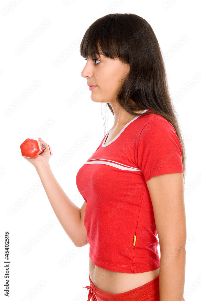 Shot of a sporty young woman with dumbbells. Shot of a sporty young woman with dumbbells.