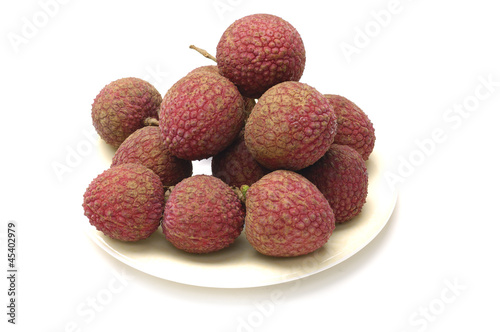 Lychees on a Plate on White Background
