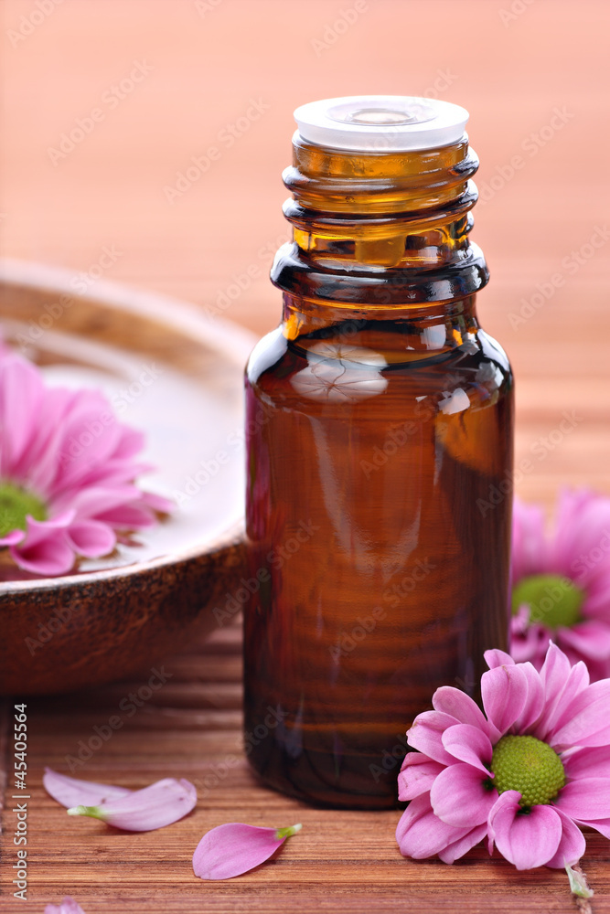 Aromatherapy bottle with pink flowers Aromatherapy bottle with pink flowers