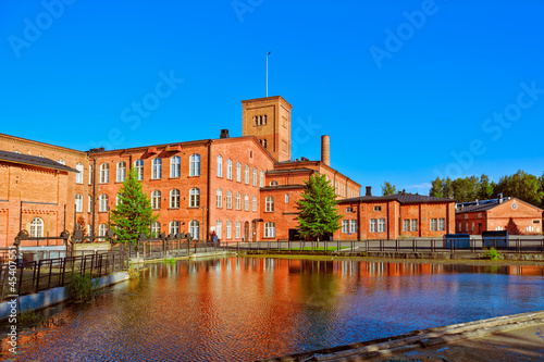 Old spinning mill buildings of red brick