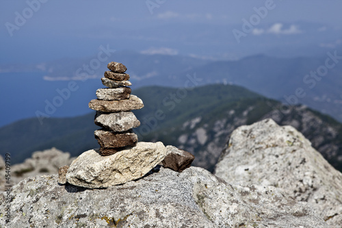 Tower of stones on mountaintop © Jan Krcmar